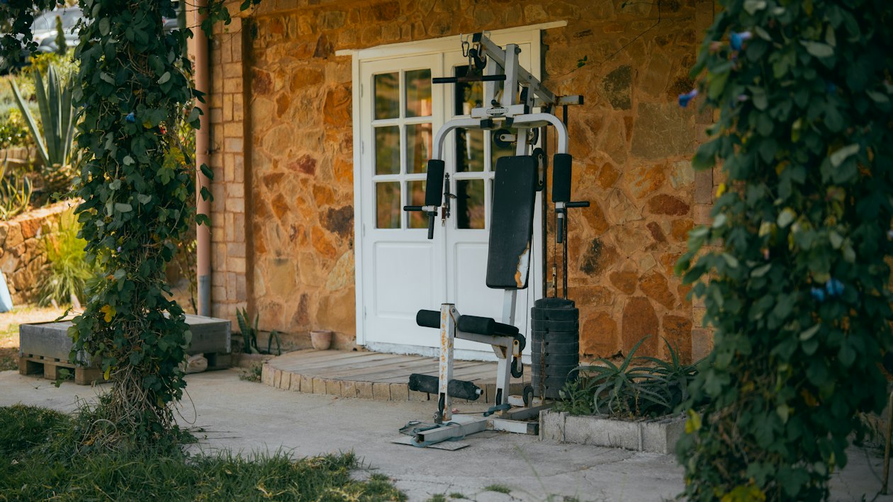 A home gym set up in a converted attic room