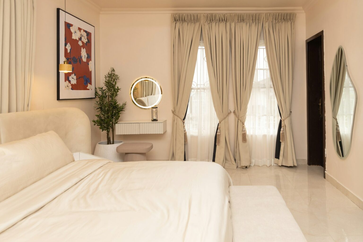 Curtains That Block the Light and Hold the Heat In A bright bedroom with full-length lined curtains at two windows